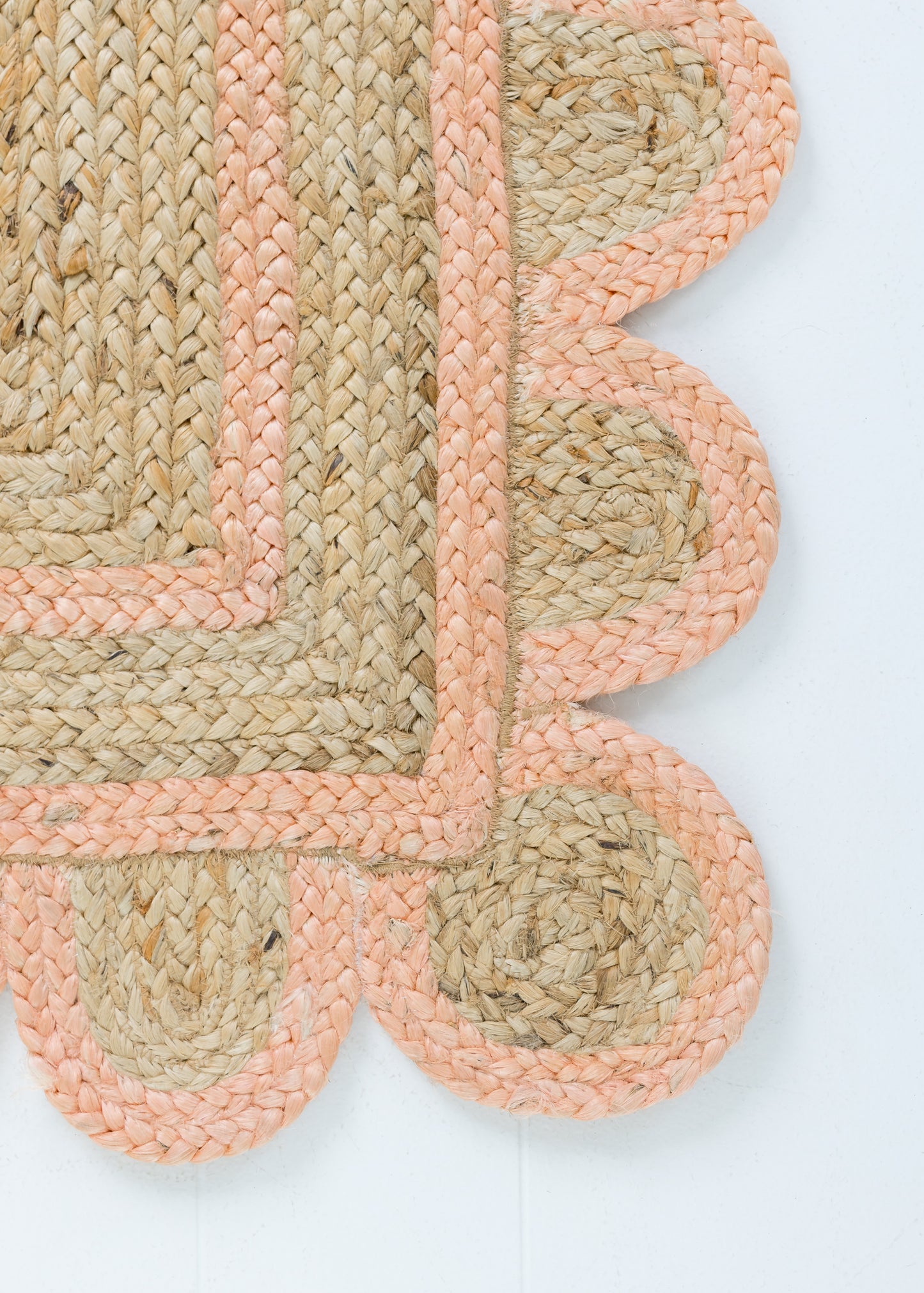 Handwoven 100% jute rug with natural field, peach scalloped edge, and protective cotton backing – Peach Scalloped Edge Jute Rug by Locust Lane Rugs