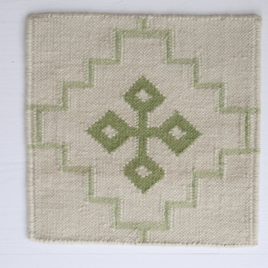Handwoven wool rug sample in pistachio green and cream geometric cross pattern – Pistachio Green Flatweave Sample by Locust Lane Rugs