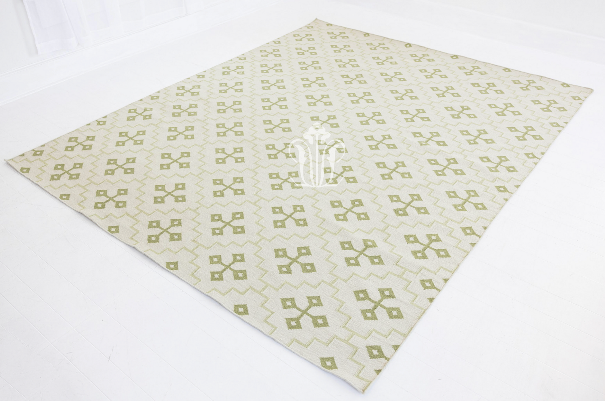 Full view of the Pistachio Green Geometric Flatweave Rug showcasing its allover geometric pattern.