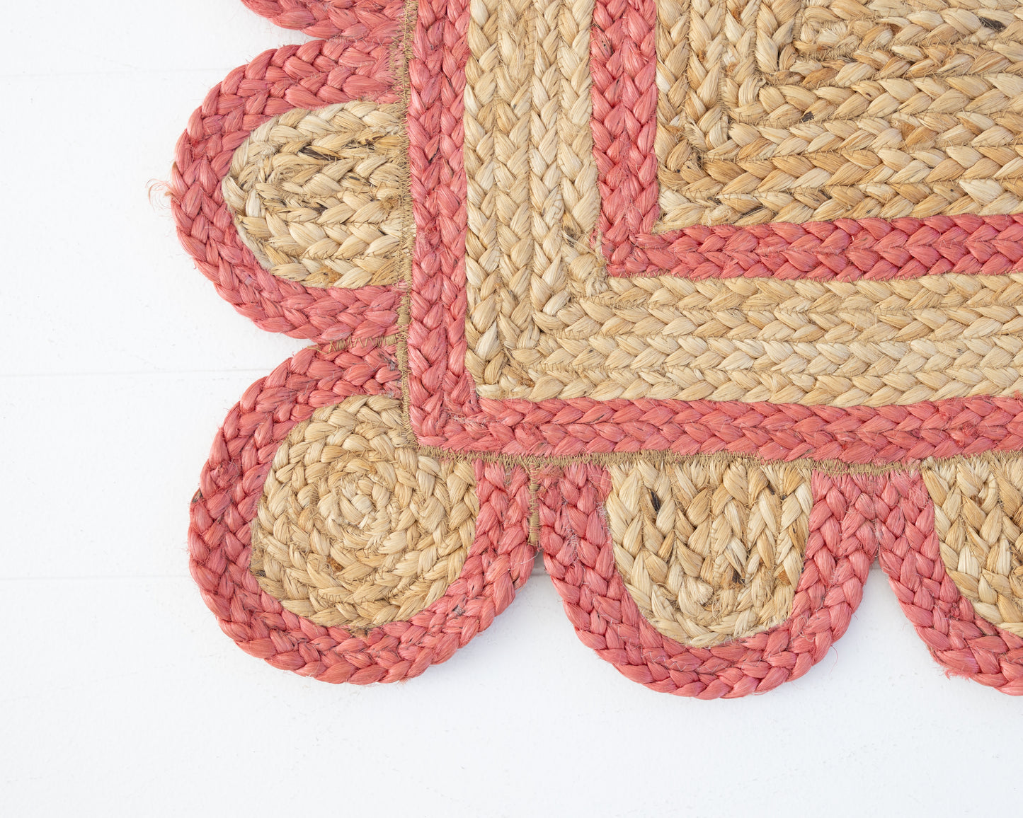 Handwoven 100% jute rug with natural field, poppy-red scalloped edge, and protective cotton backing – Poppy Scalloped Edge Jute Rug by Locust Lane Rugs