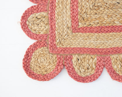Handwoven 100% jute rug with natural field, poppy-red scalloped edge, and protective cotton backing – Poppy Scalloped Edge Jute Rug by Locust Lane Rugs