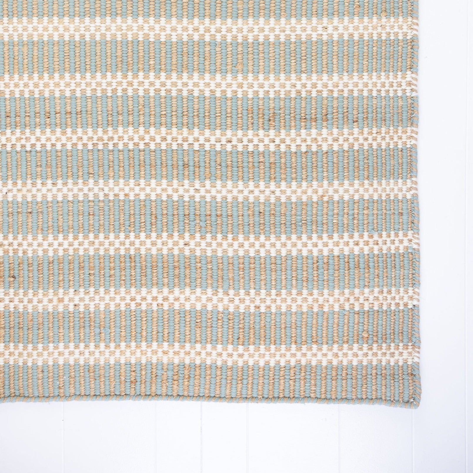 Handwoven jute and wool rug with sea blue, ivory, and natural stripes – Sea Blue Jute & Wool Rug by Locust Lane Rugs