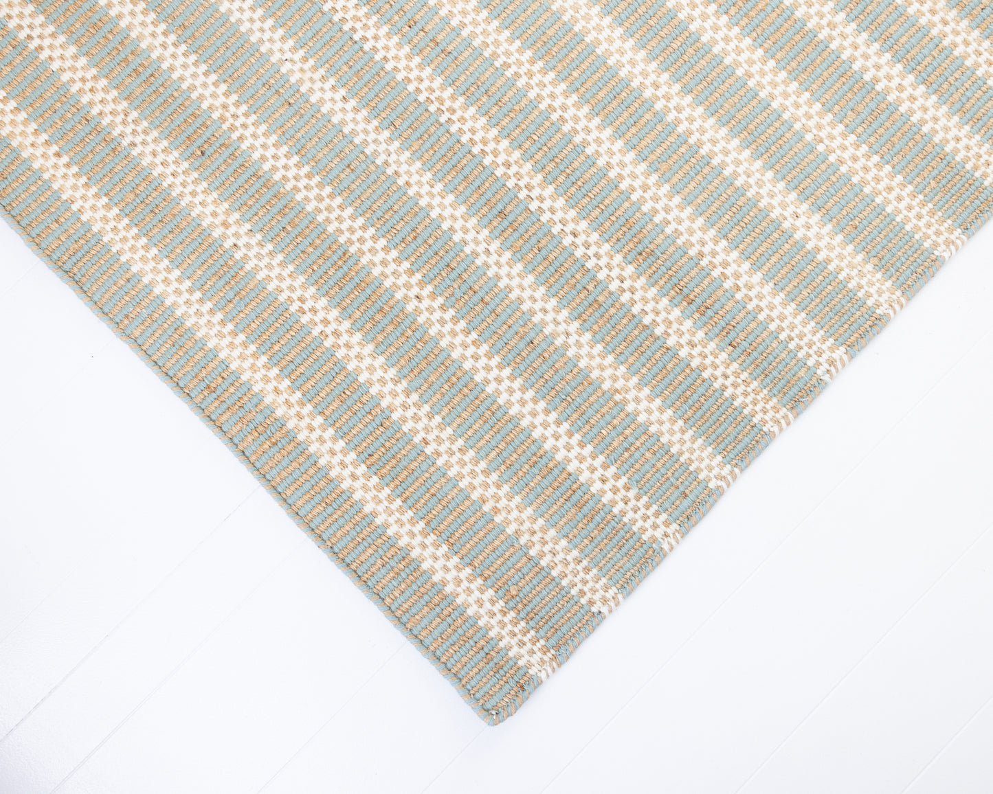 Handwoven jute and wool rug with sea blue, ivory, and natural stripes – Sea Blue Jute & Wool Rug by Locust Lane Rugs