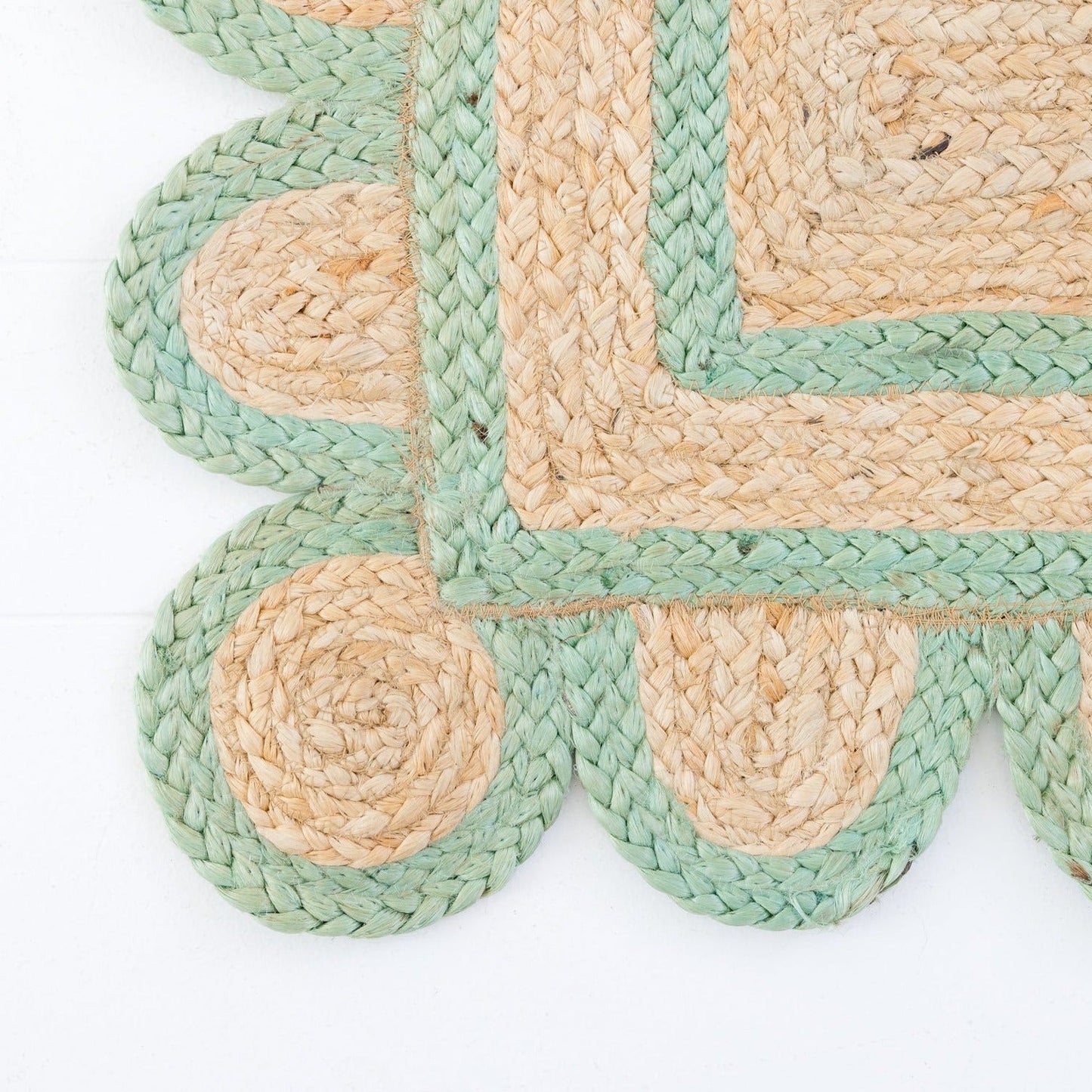 Handwoven 100% jute rug with natural field, teal green scalloped edge, and protective cotton backing – Teal Green Scalloped Edge Jute Rug by Locust Lane Rugs