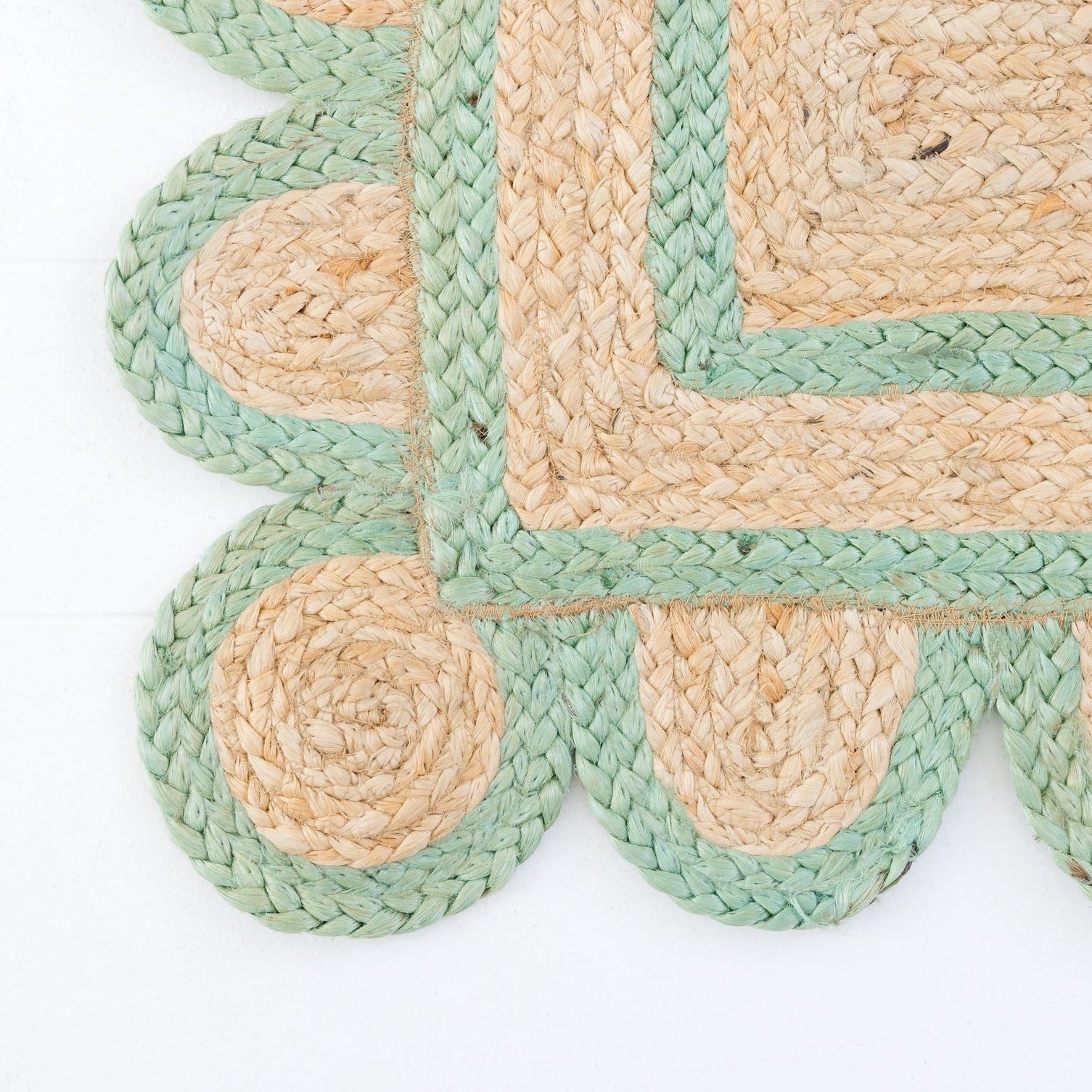 Handwoven 100% jute rug with natural field, teal green scalloped edge, and protective cotton backing – Teal Green Scalloped Edge Jute Rug by Locust Lane Rugs