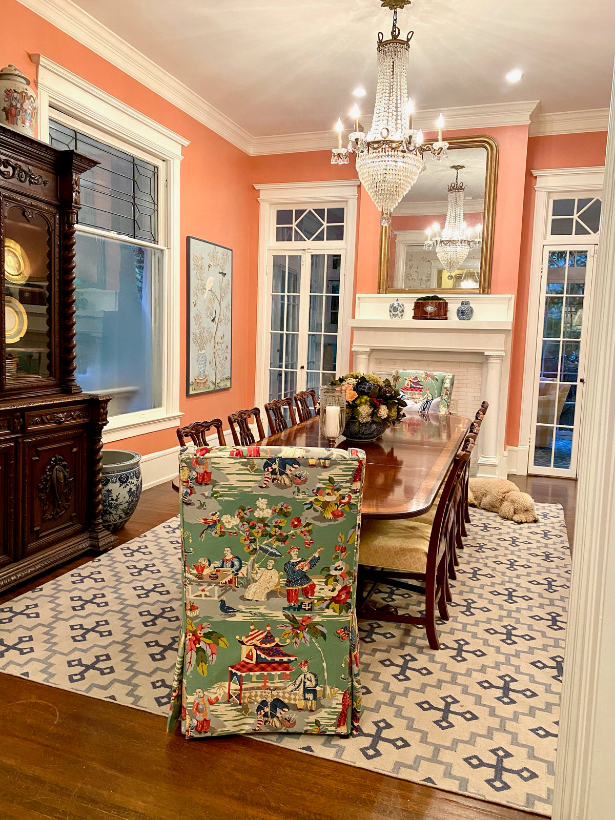 Denim Cross blue geometric wool rug styled in a colorful traditional interior