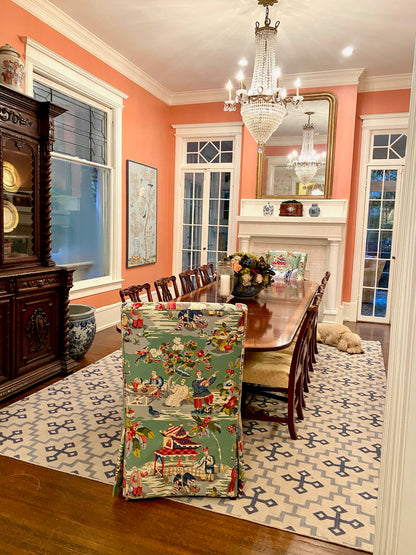 Denim Cross blue geometric wool rug styled in a colorful traditional interior