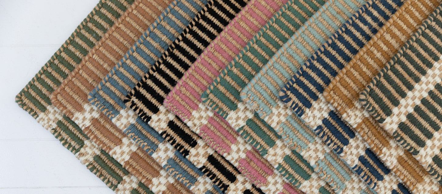 Handwoven jute and wool rug with black, ivory, and natural stripes – Black Jute & Wool Rug by Locust Lane Rugs